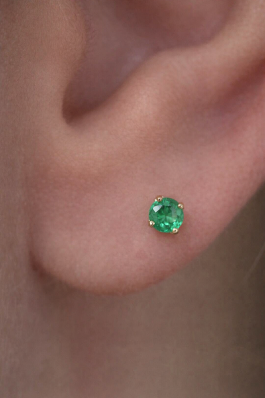 Topos con esmeralda de Oro 18k