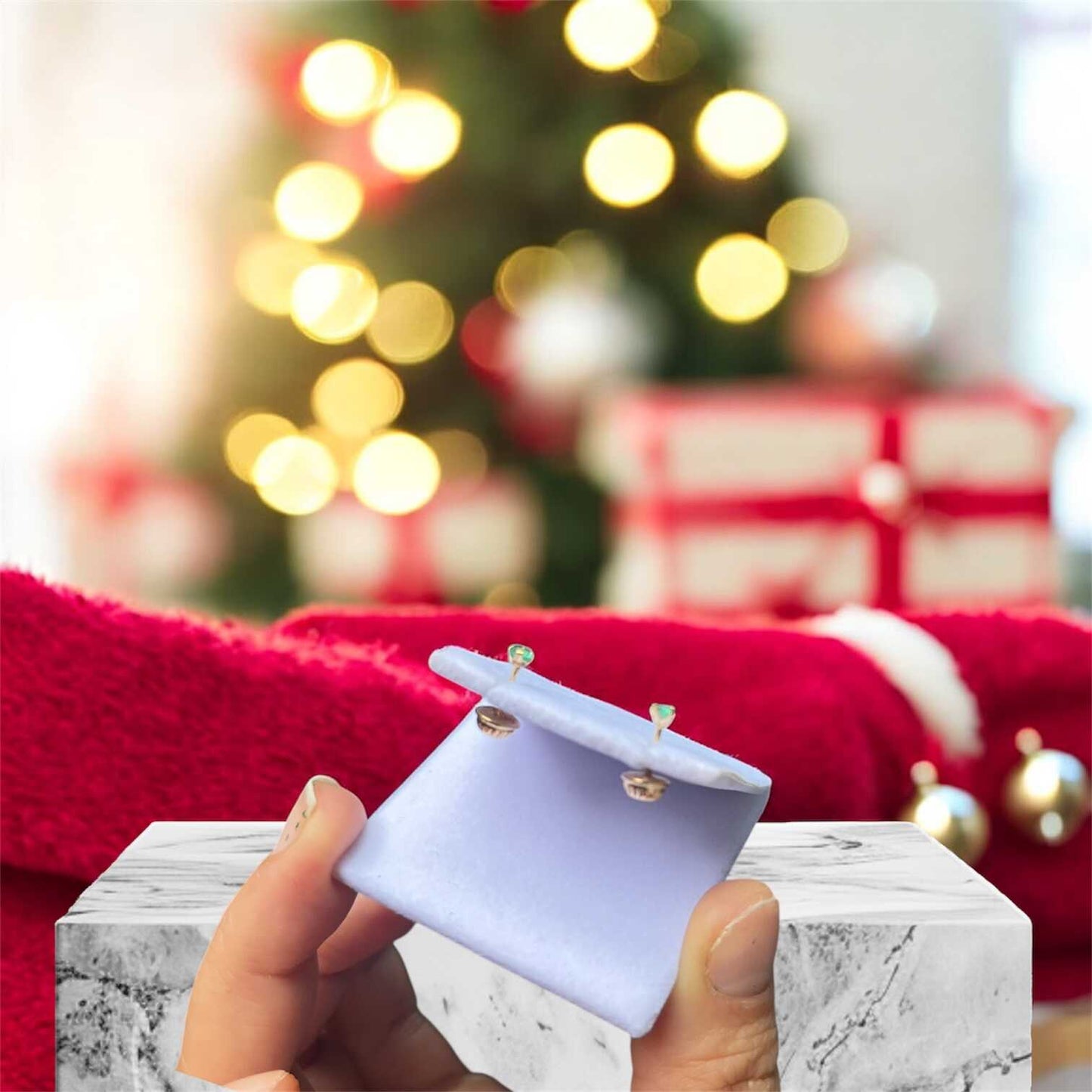 Topos con esmeralda de Oro 18k